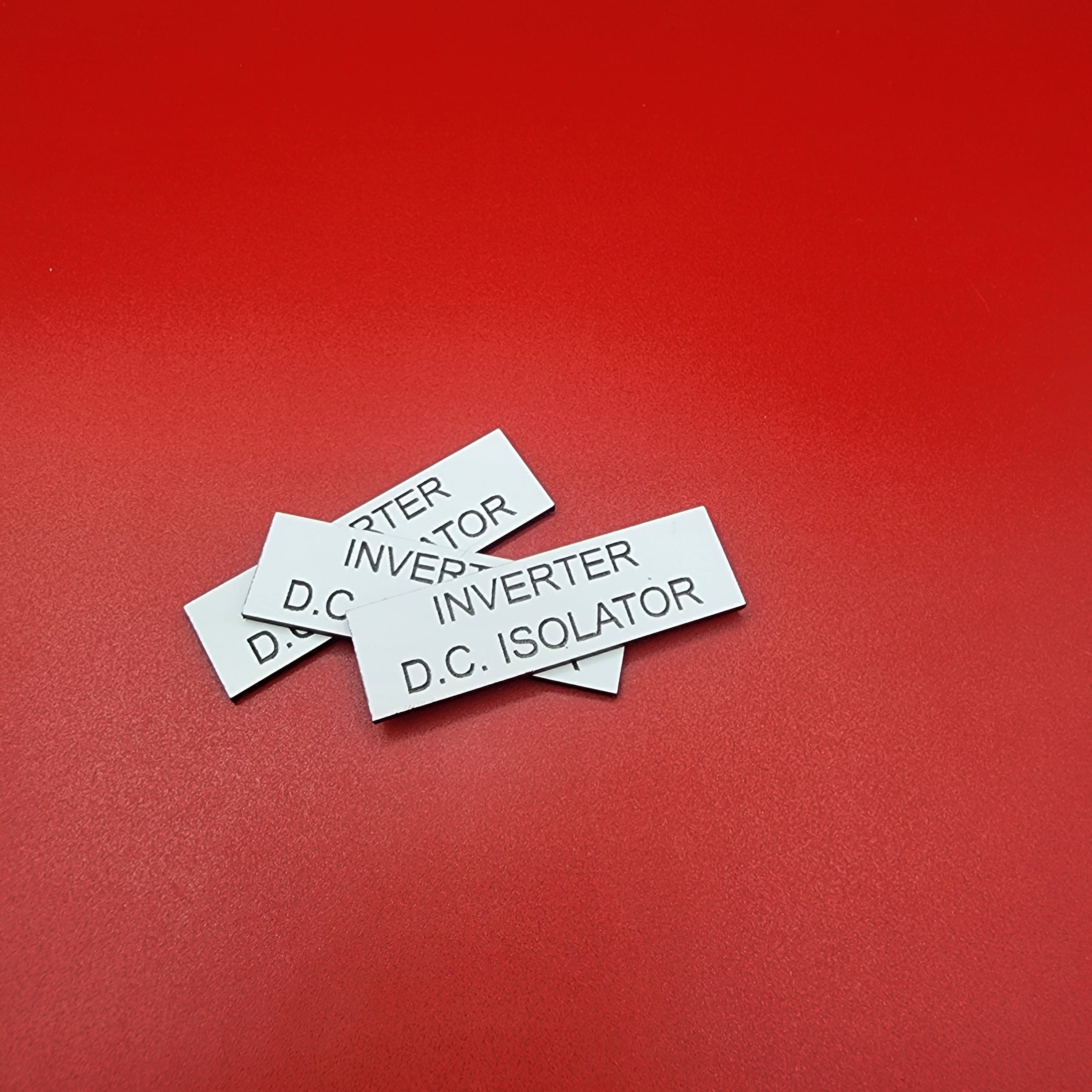 Multiple DC isolator labels showing batch production