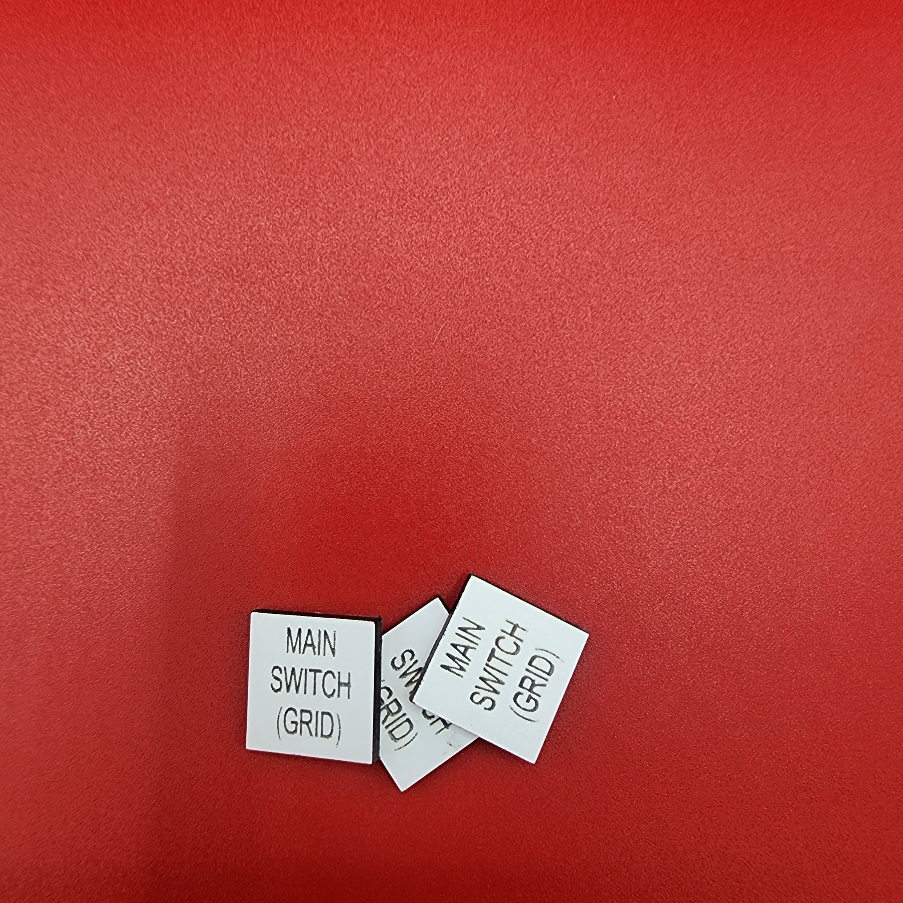 Multiple main switch grid labels showing volume production